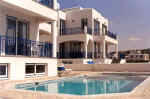 Every Villa has its own mosaic style swimming pool complete with Jacuzzi, sun beds and umbrellas. - click to enlarge 