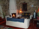 Cozy living room with a real fireplace in the winter.