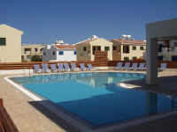 There is use of a shared  pool nearby with bar facilities. 