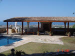 The villa Katiphoros is situated on a hillside at the upper end of Peyia. It offers views over the village and the coastline.