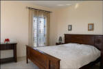 A comfy king size bed at Bella Vista villa in fig tree bay for holiday rentals